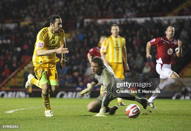 Jonas Gutierrez of Newcastle United rounds goalkeeper Dean Gerken of Bristol to score the first goal for Newcastle during the Coca-Cola Championship...