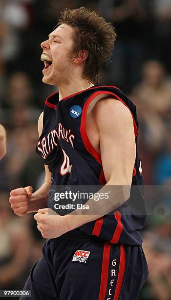 Matthew Dellavedova of the Saint Mary's Gaels celebrates the win over the Villanova Wildcats during the second round of the 2010 NCAA men's...