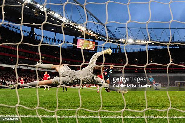 Goalkeeper Robert Green of West Ham United dives across his goal during the Barclays Premier League match between Arsenal and West Ham United at...