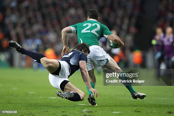 Rob Kearney of Ireland is tackled by Simon Danielli of Scotland in the incident that led to the winning penalty for Scotland during the RBS Six...