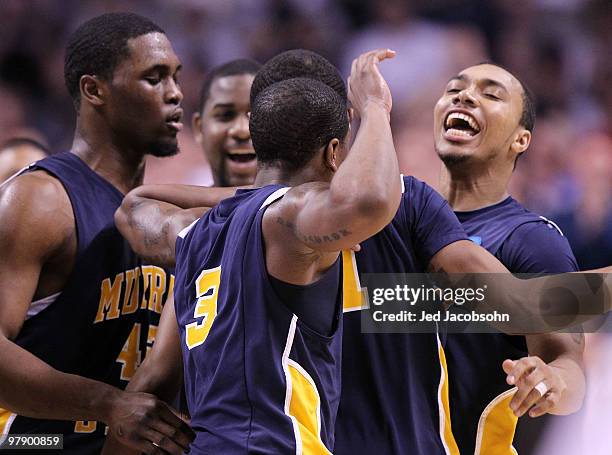 Guard B.J. Jenkins of the Murray State Racers celebrates a three point basket by Isaiah Canaan against the Butler Bulldogs at the end of the first...