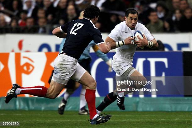 Riki Flutey of England is closed down by Yannick Jauzion of France during the RBS Six Nations Championship match between France and England at the...