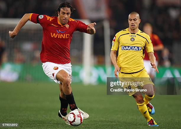 Luca Toni of AS Roma and Gohkan Inler of Udinese Calcio in action during the Serie A match between AS Roma and Udinese Calcio at Stadio Olimpico on...