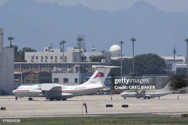 An Il-76 transport aircraft and and an An-148 regional airliner belonging to North Korea's flag carrier Air Koryo are seen parked near the VIP...