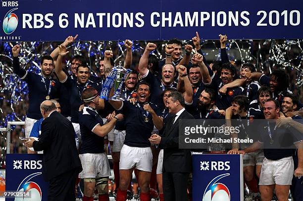 Thierry Dusautoir of France lifts the trophy after France completed the Grad Slam during the RBS Six Nations Championship match between France and...