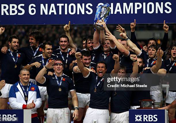 Thierry Dusautoir of France celebrates with team mates after France completed the Grad Slam during the RBS Six Nations Championship match between...