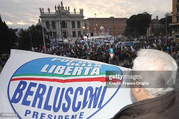 Supporters of Silvio Berlusconi's center-right party Popolo della Liberta attend a demonstration ahead of regional elections at San Giovanni square...