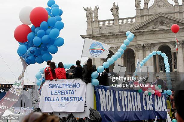 Supporters of Silvio Berlusconi's center-right party Popolo della Liberta attend a demonstration ahead of regional elections at San Giovanni square...