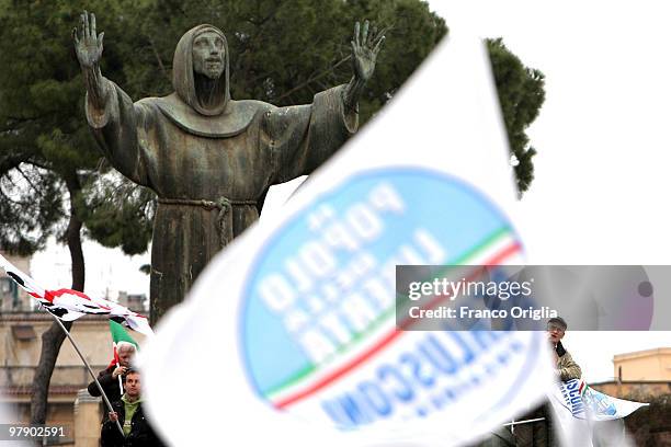 Supporters of Silvio Berlusconi's center-right party Popolo della Liberta attend a demonstration ahead of regional elections at San Giovanni square...