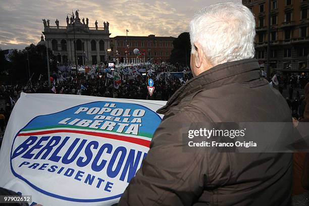 Supporters of Silvio Berlusconi's center-right party Popolo della Liberta attend a demonstration ahead of regional elections at San Giovanni square...
