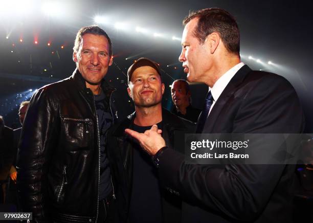 Ralf Moeller, Til Schweiger and Henry Maske are seen prior to the WBO Heavyweight World Championship fight between Wladimir Klitschko of Ukraine and...