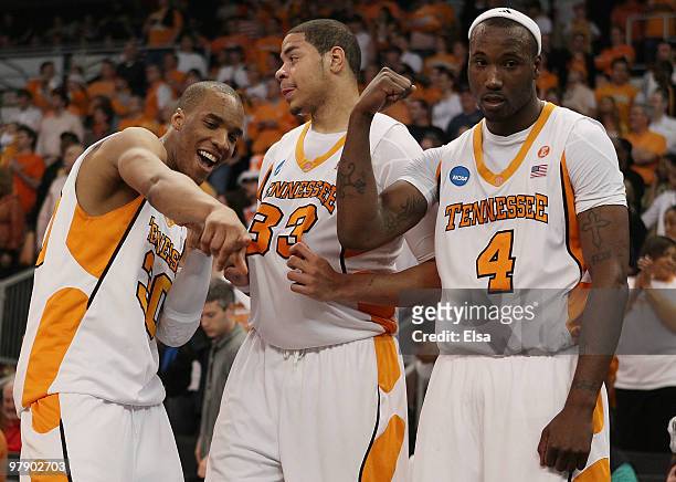 Prince, Brian Williams and Wayne Chism of the Tennessee Volunteers celebrate the win over the Ohio Bobcats during the second round of the 2010 NCAA...