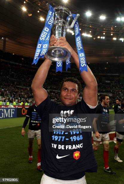Thierry Dusautoir of France lifts the trophy after France completed the Grad Slam during the RBS Six Nations Championship match between France and...