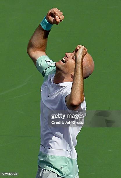 Ivan Ljubicic of Croatia celebrates following his victory over Rafael Nadal of Spain during the BNP Paribas Open at the Indian Wells Tennis Garden on...