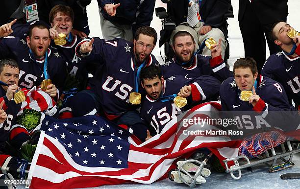 Team USA celebrates their 2-0 win over Japan during the Ice Sledge Hockey Gold Medal Game between the United States and Japan on day nine of the 2010...