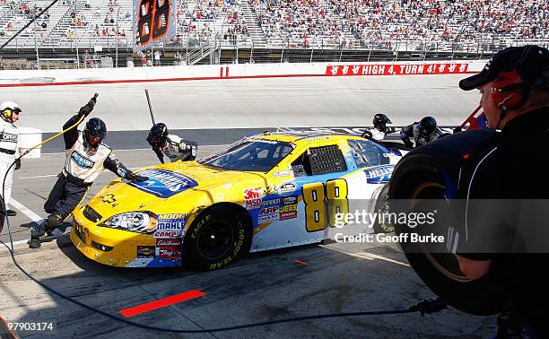 Kelly Bires, driver of the Hellmanns Chevrolet, pits during the NASCAR Nationwide Series Scotts Turf Builder 300 at Bristol Motor Speedway on March...