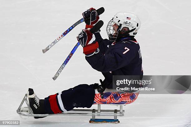 Taylor Lipsett of the United States celebrates defeating Japan 2-0 during the Ice Sledge Hockey Gold Medal Game between the United States and Japan...