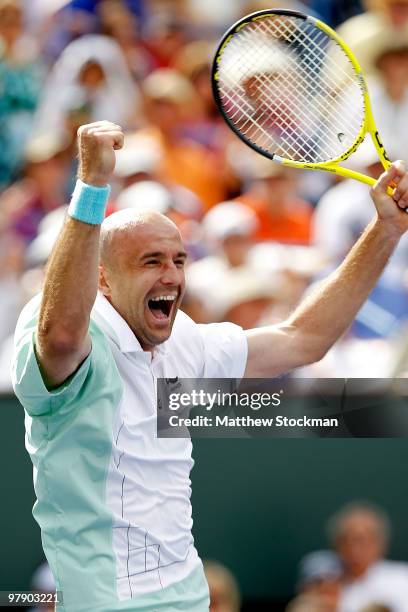 Ivan Ljubicic of Croatia celebrates match point against Rafael Nadal of Spain during the semifinals of the BNP Paribas Open on March 20, 2010 at the...