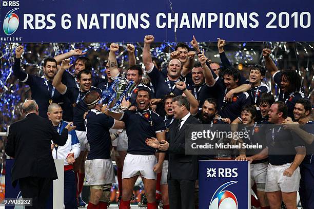 Thierry Dusautoir of France lifts the trophy after France completed the Grand Slam during the RBS Six Nations Championship match between France and...