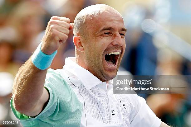 Ivan Ljubicic of Croatia celebrates match point against Rafael Nadal of Spain during the semifinals of the BNP Paribas Open on March 20, 2010 at the...