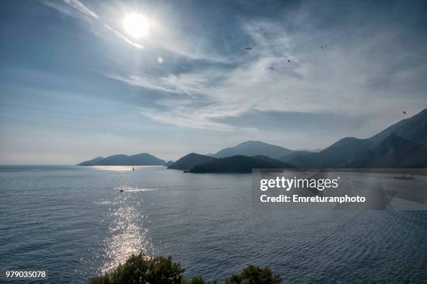 view of oludeniz shores on a tranquil day - emreturanphoto stock pictures, royalty-free photos & images