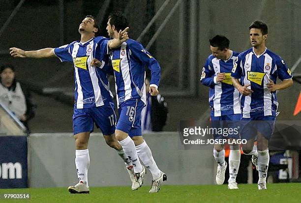 Espanyol's Pablo Daniel Osvaldo of Argentina is congratuled by his teammate and compatriot Nicolas Pareja after scoring his second goal against...