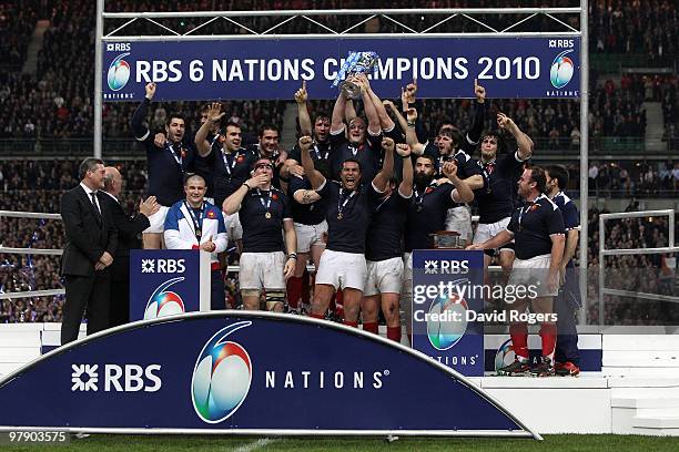 Thierry Dusautoir of France celebrates with team mates after France completed the Grand Slam during the RBS Six Nations Championship match between...