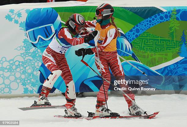 Henrieta Farkasova of Slovakia and guide Natalia Subrtova celebrate after the Women's Visually Impaired Super Combined Slalom during Day 9 of the...