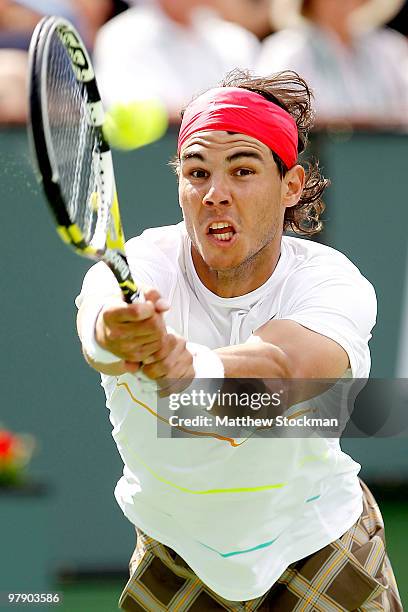 Rafael Nadal of Spain lunges for a shot against Ivan Ljubicic of Croatia during the semifinals of the BNP Paribas Open on March 20, 2010 at the...