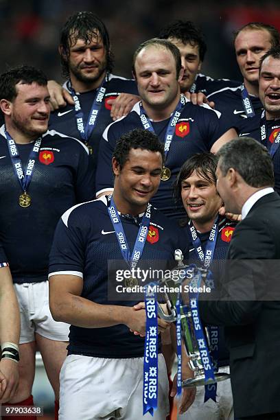 Thierry Dusautoir of France receives the trophy after France completed the Grand Slam during the RBS Six Nations Championship match between France...