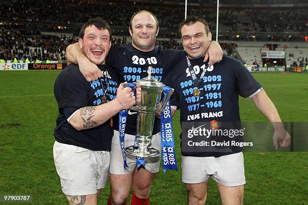 Thomas Domingo, William Servat and Nicolas Mas hold the trophy after France completed the Grand Slam during the RBS Six Nations Championship match...