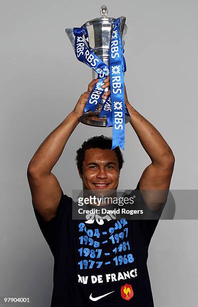 Thierry Dusautoir the captain of France celebrates with the trophy after winning the Grand Slam and Championship during the RBS Six Nations...