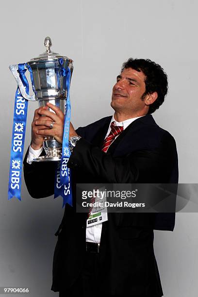 Marc Lievremont the head coach of France celebrates with the trophy after winning the Grand Slam and Championship during the RBS Six Nations...