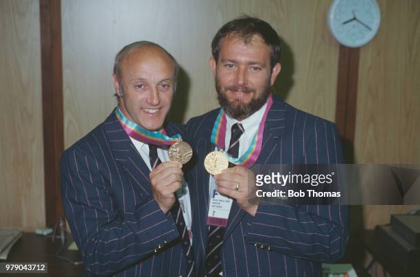 Great Britain's gold medal winner Malcolm Cooper pictured on right with fellow Great Britain sport shooter Alister Allen , who took bronze in the...