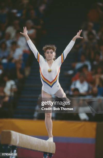 Romanian gymnast Ecaterina Szabo pictured in action on the balance beam during competition in the Women's artistic individual all-around gymnastics...