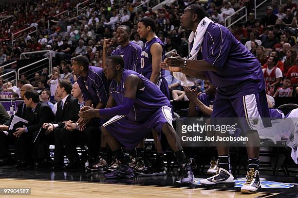 The Washington Huskies bench reacts to a play against the New Mexico Lobos during the second round of the 2010 NCAA men's basketball tournament at HP...
