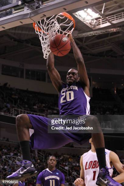 Forward Quincy Pondexter of the Washington Huskies dunks the ball against the New Mexico Lobos during the second round of the 2010 NCAA men's...