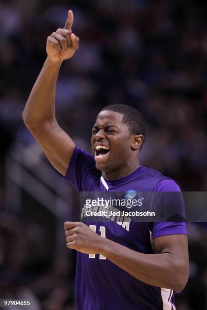 Forward Matthew Bryan-Amaning of the Washington Huskies celebrates a play against the New Mexico Lobos during the second round of the 2010 NCAA men's...