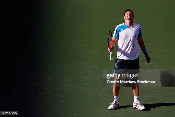 Robin Soderling of Sweden reacts to a lost point against Andy Roddick during the semifinals of the BNP Paribas Open on March 20, 2010 at the Indian...