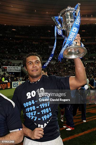 Thierry Dusautoir of France lifts the trophy after France completed the Grand Slam during the RBS Six Nations Championship match between France and...