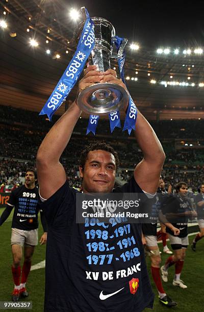 Thierry Dusautoir of France lifts the trophy after France completed the Grand Slam during the RBS Six Nations Championship match between France and...