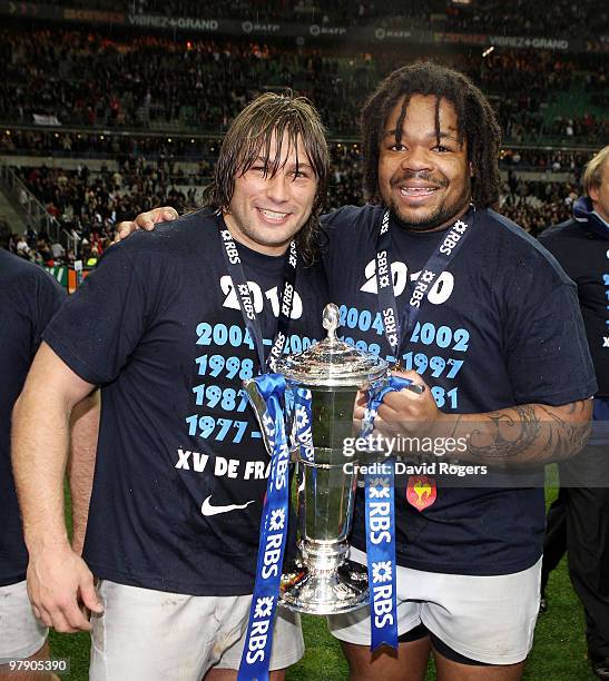 Dimitri Szarzewski and Mathieu Bastareaud of France pose with the trophy after winning the Grand Slam during the RBS Six Nations Championship match...