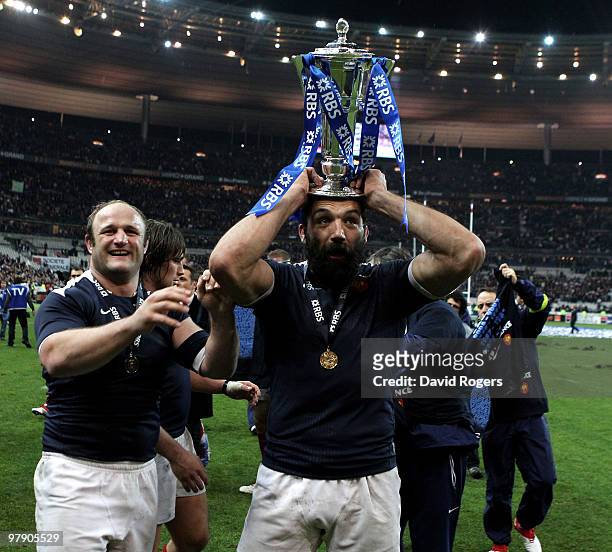 Sebastien Chabal of France holds the trophy with team mate William Servat after France completed the Grand Slam during the RBS Six Nations...