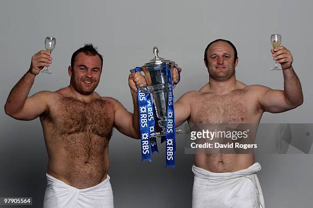 Prop forward Nicolas Mas and hooker William Servat of France celebrate with the trophy after winning the Grand Slam and Championship during the RBS...