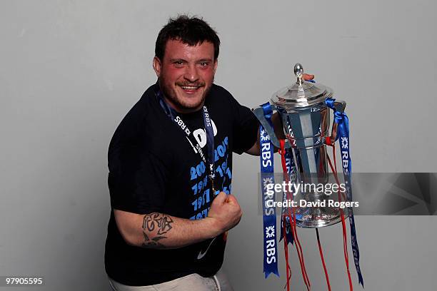 Prop forward Thomas Domingo of France celebrates with the trophy after winning the Grand Slam and Championship during the RBS Six Nations...