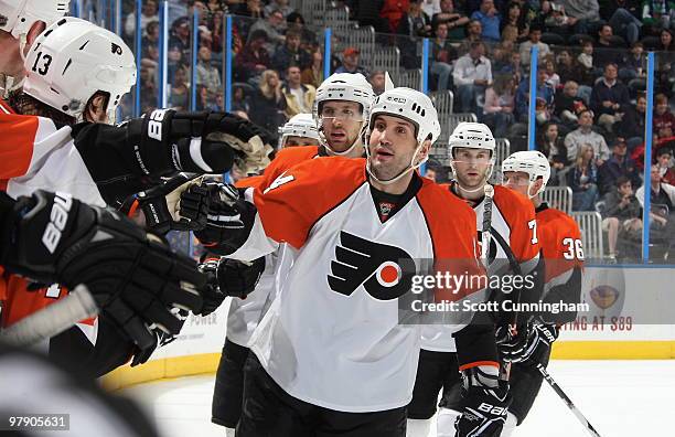 Ian Laperriere of the Philadelphia Flyers celebrates with teammates after a goal against the Atlanta Thrashers at Philips Arena on March 20, 2010 in...