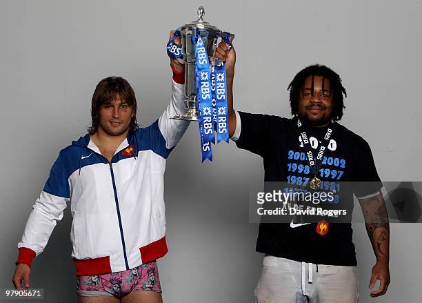 Hooker Dimitri Szarzewski and Mathieu Bastareaud of France celebrates with the trophy after winning the Grand Slam and Championship during the RBS...