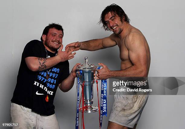 Prop Thomas Domingo of France Lock forward Julien Pierre of France celebrate with the trophy after winning the Grand Slam and Championship during the...