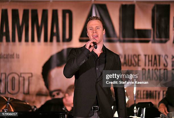 Singer Fraser Walters of The Canadian Tenors performs onstage during the Celebrity Fight Night XVI Founder's Dinner held at JW Marriott Desert Ridge...