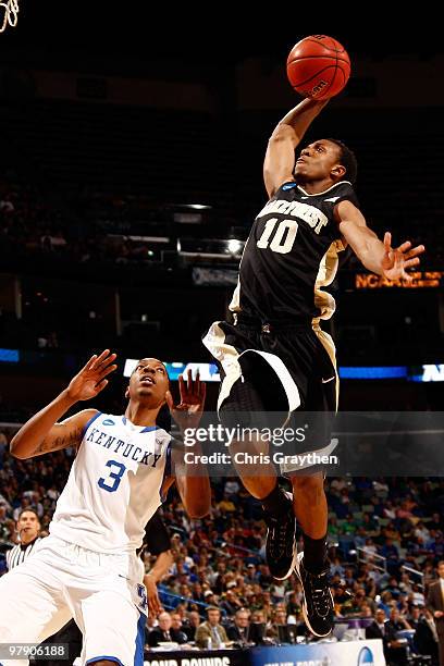 Ishmael Smith of the Wake Forest Demon Deacons attempts to dunk the ball ober Darnell Dodson of the Kentucky Wildcats during the second round of the...